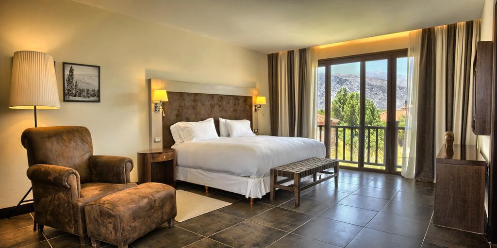 Grace Cafayate Hotel ภายนอก รูปภาพ A bedroom at the hotel
